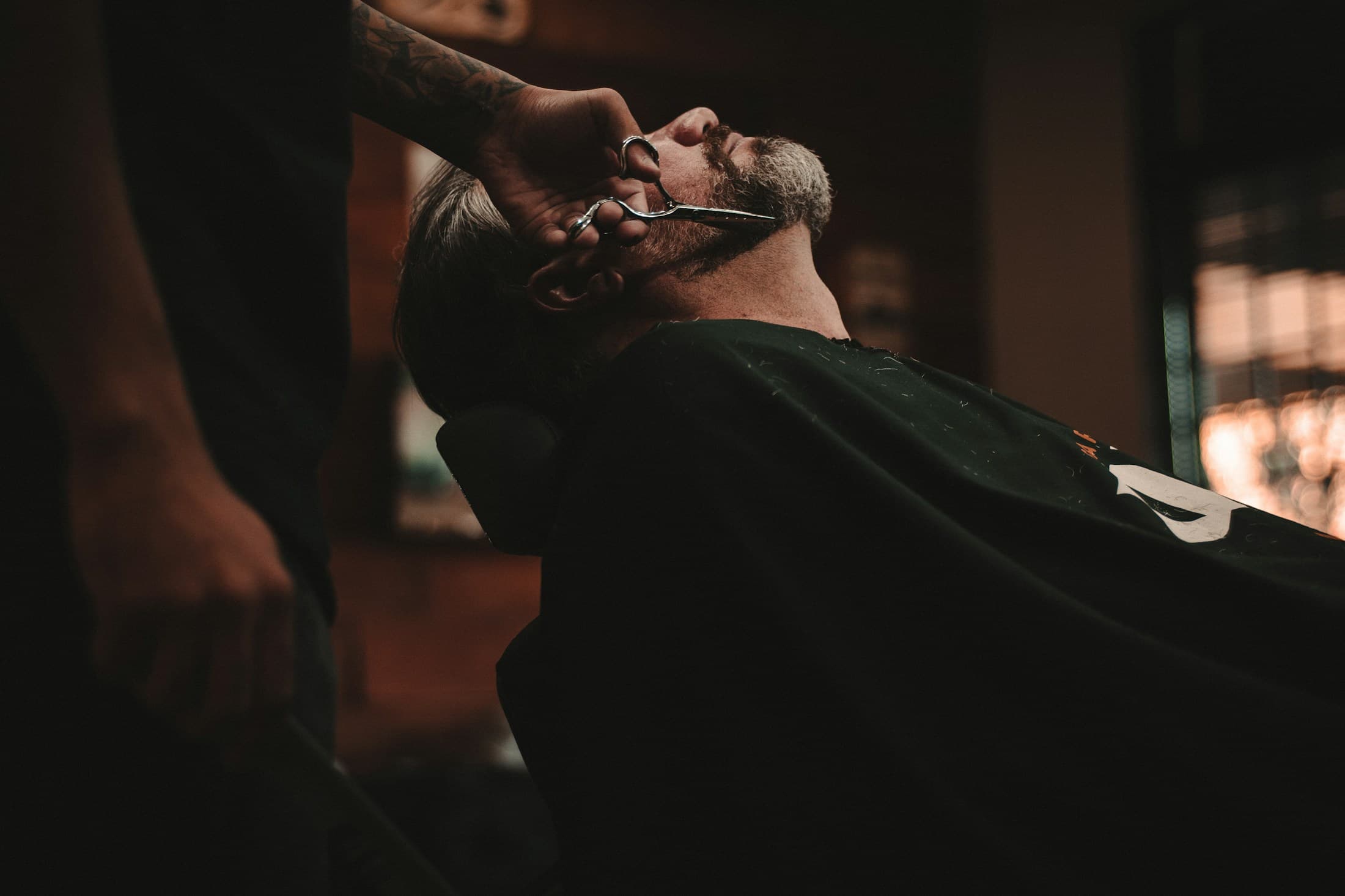 Barber working in a modern barbershop